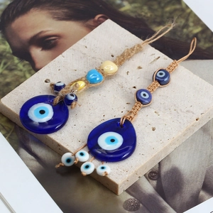 Handmade Evil Eye nazar glass pendants with rustic jute rope for home or car decor