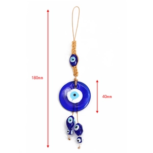 Detail view of 180mm blue glass evil eye lucky charm with woven cord and 40mm pendant