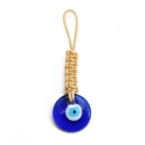 Detail of blue glass Nazar evil eye charm with beige hand-woven rope for bags or keys