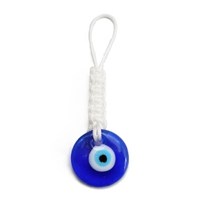 Close-up of Turkish Evil Eye glass charm with detailed white braided cord on white background