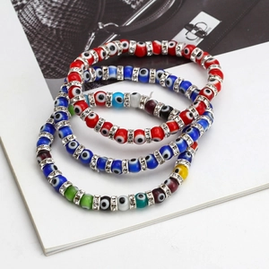 Three-piece set of Evil Eye beaded bracelets with silver spacers and sparkling rhinestones