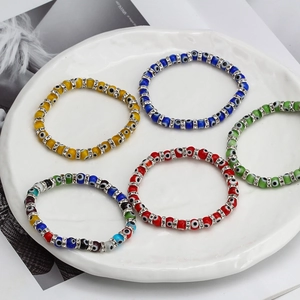 Handcrafted Evil Eye beaded bracelets with crystal spacers in five vibrant color options
