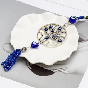 Porte-clés Arbre de Vie avec perles Mauvais Œil bleues et gland sur plateau céramique