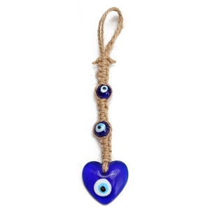 Detail of blue glass heart Evil Eye charm with handcrafted woven rope hanging strap
