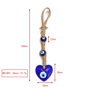 Detail view of handmade evil eye heart charm with dimensions 160mm total length and weight