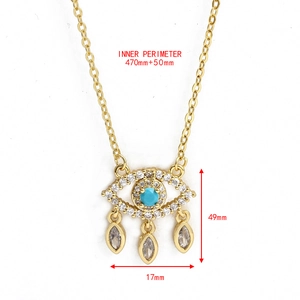 Détail du pendentif œil de démon avec turquoise bleue et zircons incluant les dimensions