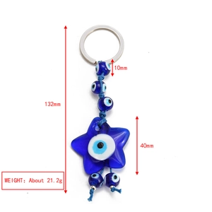 Detail showing dimensions of blue Evil Eye keychain with star pendant and glass beads