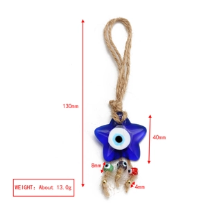 Star-shaped evil eye glass pendant with blue finish and decorative beads detail