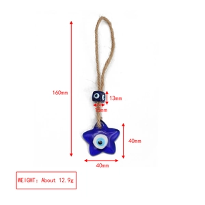 Macro detail of Evil Eye star keychain with precise measurement and weight specifications