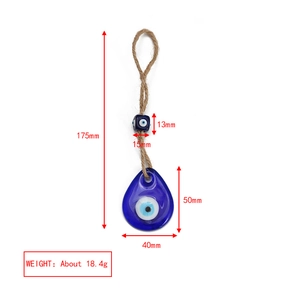 Detail view of the evil eye glass pendant with dimensions and retro hemp rope