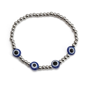 Detail showing silver round beads and blue evil eye charms on this fashion bracelet