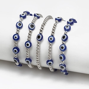 Set of five silver beaded Evil Eye bracelets with blue resin charms for men and women