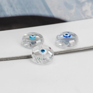 Macro view of faceted evil eye glass beads for DIY necklace and jewelry making