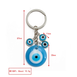 Dettaglio dimensioni del portachiavi con malocchio blu con misure e peso indicati