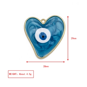 Detail view showing a 29mm blue Evil Eye heart pendant with precise measurements and weight