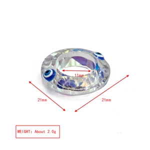Detailed view of evil eye faceted crystal charm showing 21mm and 11mm dimensions