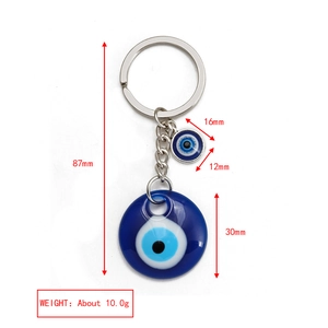 Detailed specs of the blue evil eye keychain showing dimensions 30mm and 87mm length