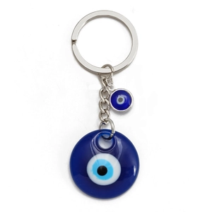 Close-up of Turkish Evil Eye keychain with blue resin beads and silver metal rings