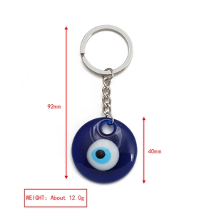Detail view showing 40mm Turkish Evil Eye keychain pendant with dimensions and weight info