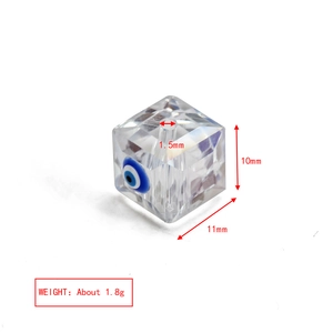 Detail view of 10mm faceted evil eye cube bead with 1.5mm hole for jewelry making