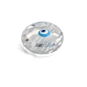 Macro shot of faceted evil eye glass bead with blue concentric circles for DIY jewelry making