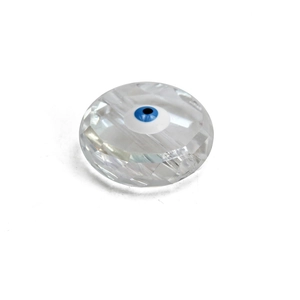 Macro shot of a faceted transparent bead featuring a blue Evil Eye Nazar amulet design