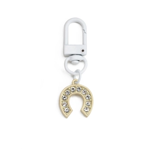 Golden horseshoe evil eye keychain with sparkling crystals and white lacquer hook detail