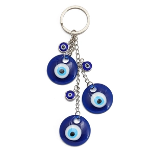 Macro detail of Evil Eye keychain with blue beads and silver-tone alloy ring and chains