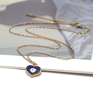 Collana con cuore dorato ed occhio di Allah in smalto blu con chiusura a moschettone regolabile