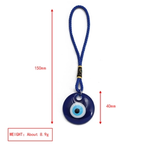 Detailed view of evil eye glass charm with 150mm length and 40mm diameter dimensions