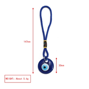 Detail view of evil eye charm with dimensions 147mm length and 30mm diameter