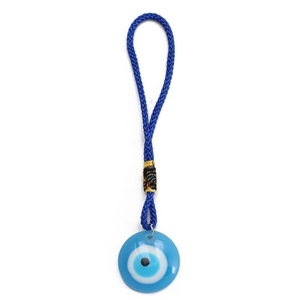 Detail of Turkish evil eye pendant with blue glass charm and woven hanging cord