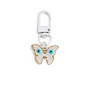 White butterfly evil eye keychain with gold trim and white metal lobster clasp