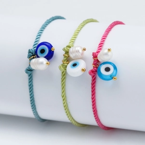 Three-piece woven evil eye bracelets with freshwater pearls in blue, green and pink