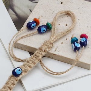 Handmade Evil Eye keychain with braided rope and blue glass beads for bags and cars