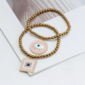 Bracelets élastiques à billes dorées bohème avec œil maléfique rose et breloque géométrique
