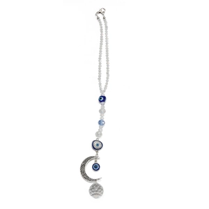 Detailed view of the Evil Eye pendant featuring a hollow moon and faceted crystal ball