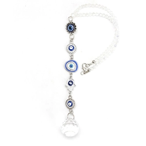Detailed view of the Hamsa hand and evil eye charms with a faceted crystal ball pendant