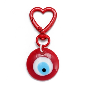 Detailed view of red heart-shaped carabiner with a round blue evil eye charm keychain
