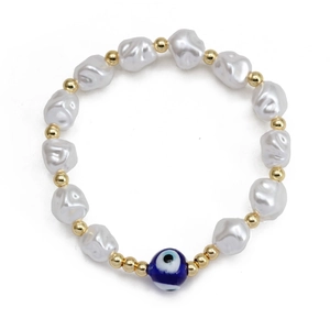 Handmade baroque pearl bracelet with golden beads and a blue evil eye centerpiece charm