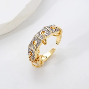 Two-tone geometric open ring with cubic zirconia paving and metallic chain details