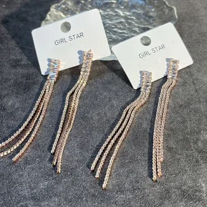 Luxurious rose gold tassel earrings with rectangular zircons for elegant evening wear