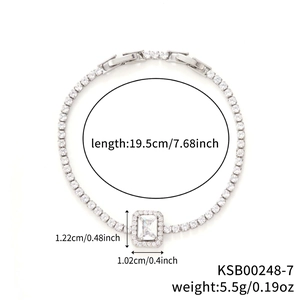 Silver tennis bracelet detail with rectangular zircon center and micro-paved rhinestones