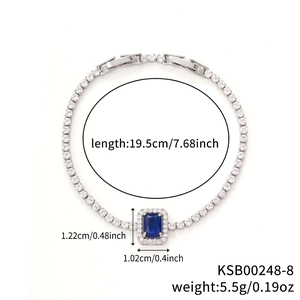 Detail view of silver tennis bracelet with blue rectangle zircon and size parameters