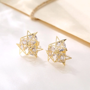 3D geometric star earrings in gold finish with sparkling cubic zirconia stones
