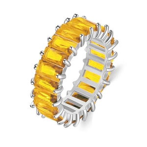 Eternity band ring featuring emerald cut yellow zircons in silver finish