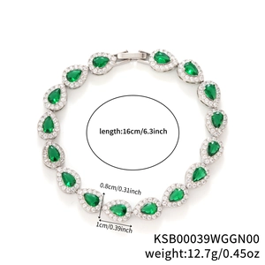 Silver geometric bracelet with teardrop emerald stones and paved cubic zirconia