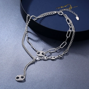 Collier multi-rangs argenté élégant avec maillons grain de café et zircons brillants