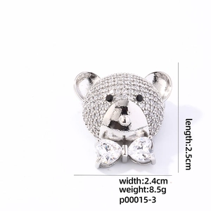 Sparkling bear stud earring with white rhinestones and heart bow in 2.5cm size