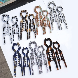U-shaped hair pins with cat ear design in assorted marble and tortoise patterns